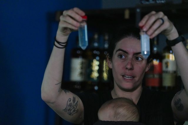 Anna Klompen, postdoc in the Gibson Lab, presents her work on jellyfish and stingers for Science Over Spirits at Mitch e Amaro,, May 13, 2026.