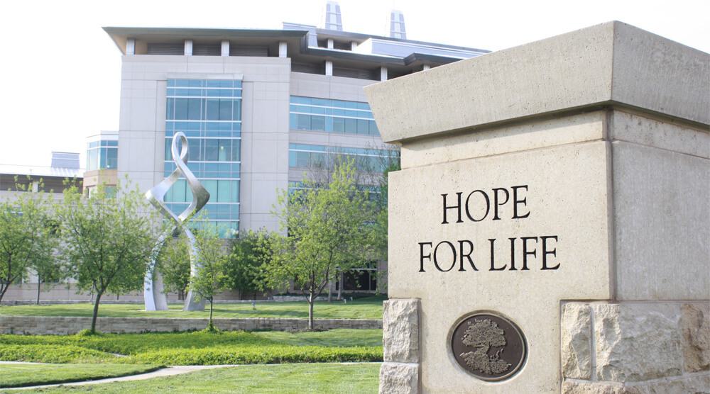 Hope for Life pillar at entrance to Stowers campus