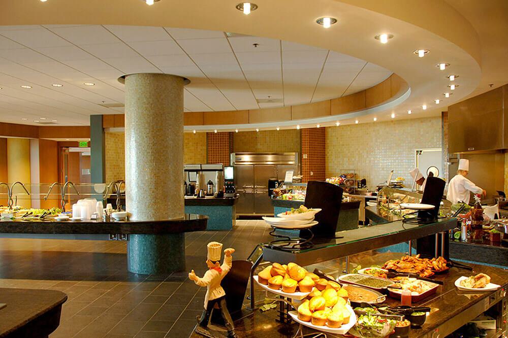 cafeteria lobby with buffet of food and chef stations